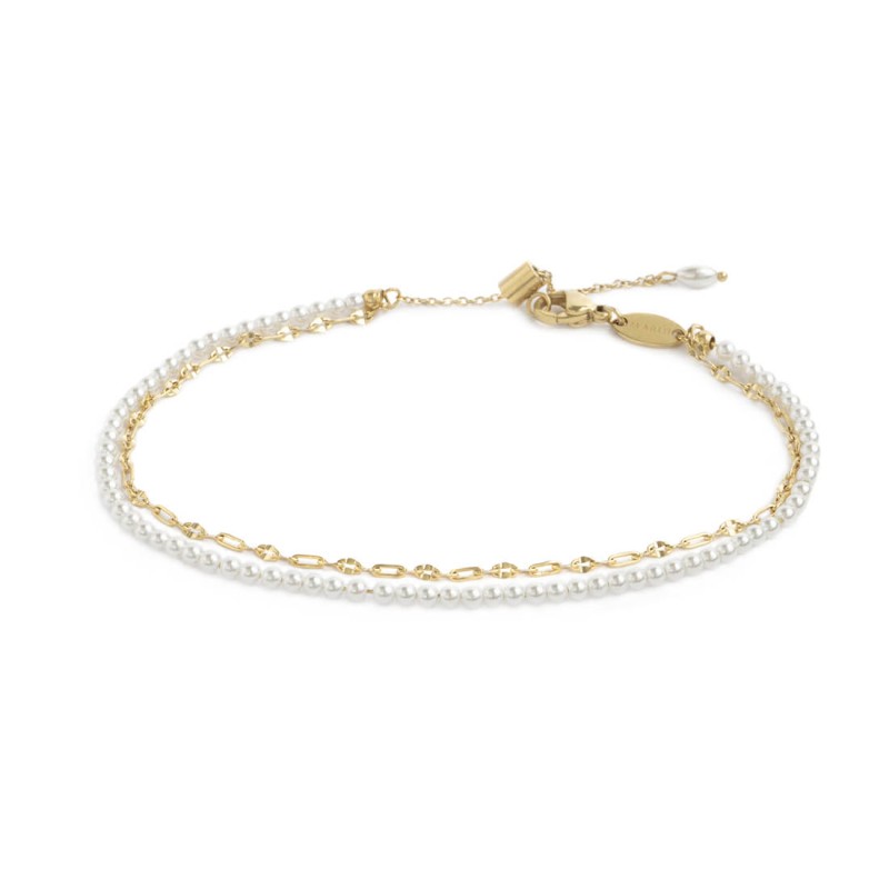 Cavigliera doppia catena con perle bianche e lip-cable base gialla