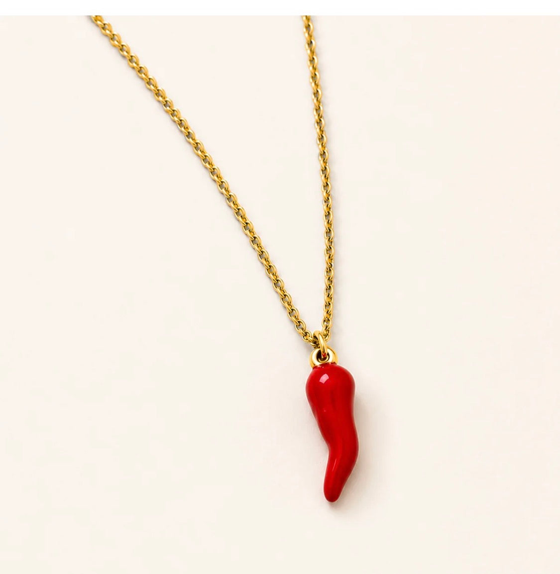 COLLANA CORNO ROSSO BASE ACCIAIO DORATO