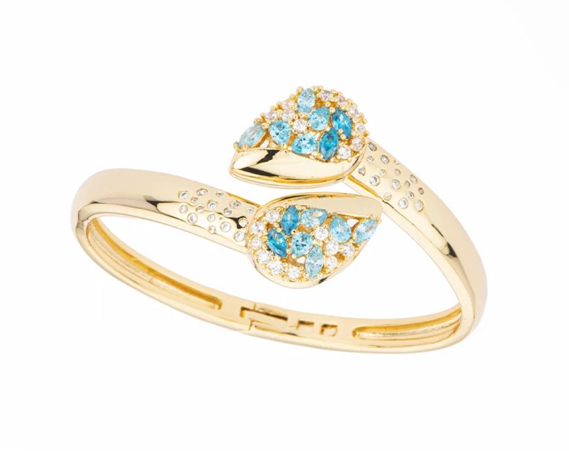 BRACCIALE RIGIDO DORATO CON ZIRCONI E PIETRE CELESTI