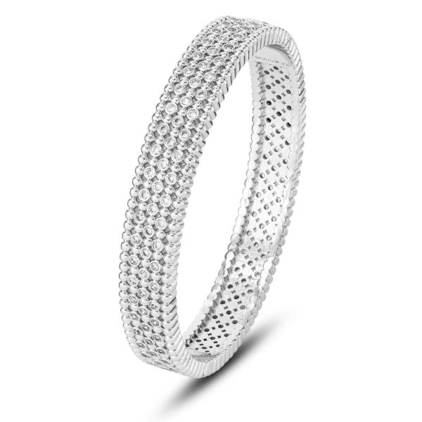 Bracciale rigido con texture sferica e zirconi incastonati.