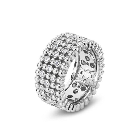 Anello a fascia larga con texture sferica e zirconi incastonati.