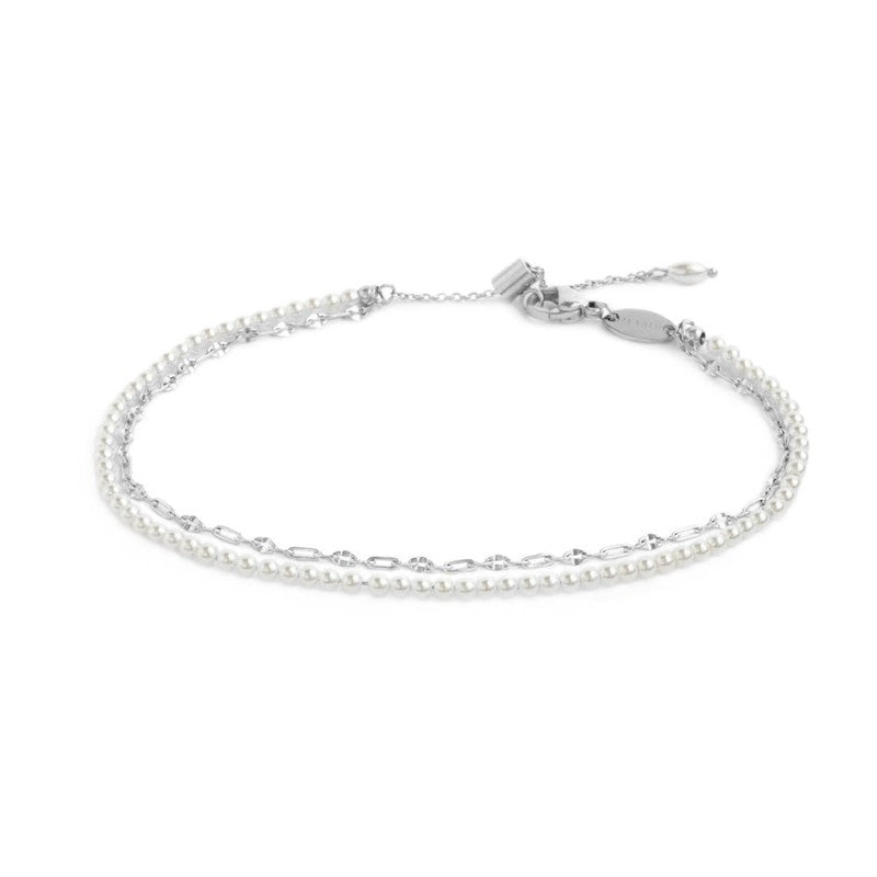 Cavigliera doppia catena con perle bianche e lip-cable base bianca