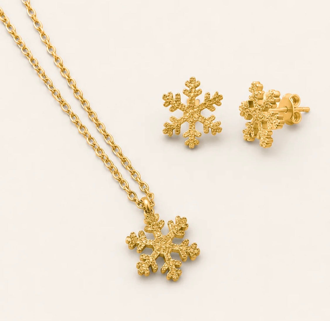 PARURE FIOCCO DI NEVE ACCIAIO DORATO